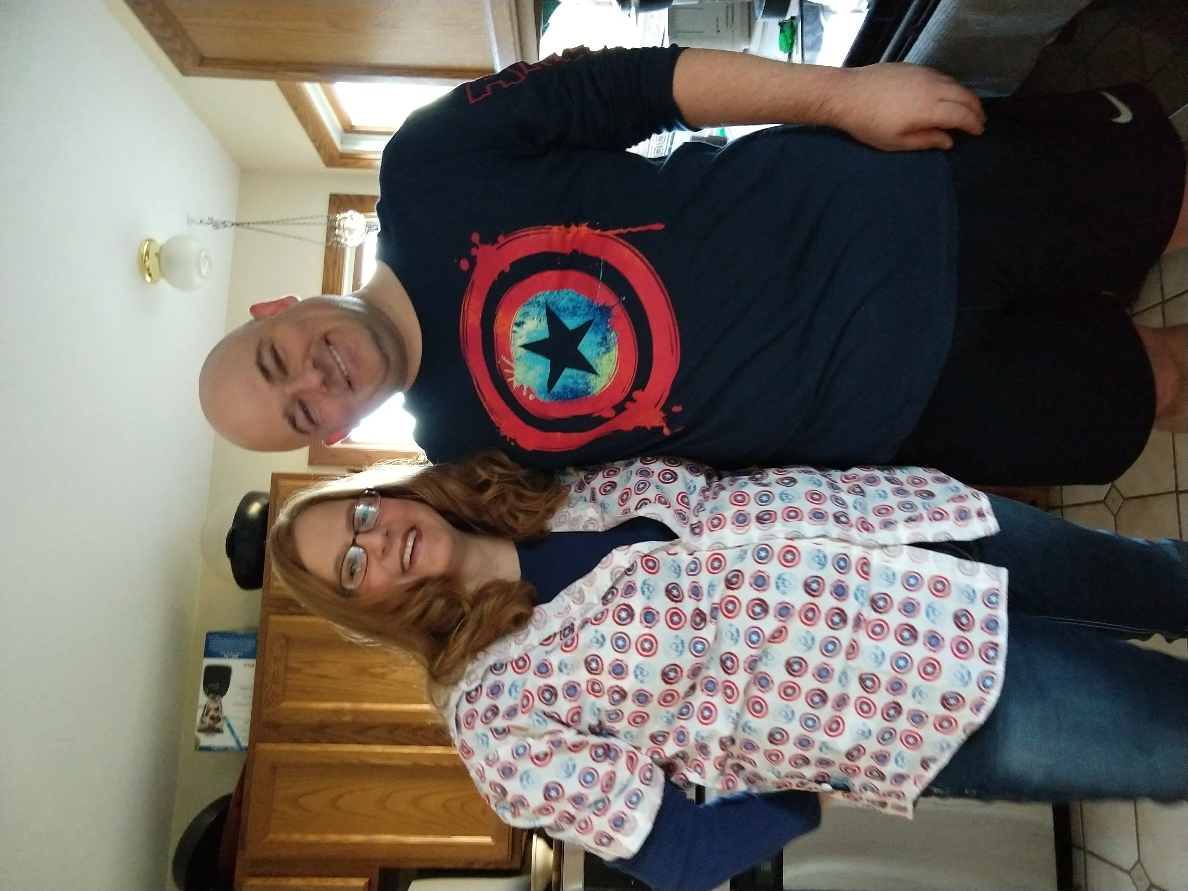 Britta S. (Wilson) Brossard and Matthew H. Brossard smiling together in their kitchen, December 2017